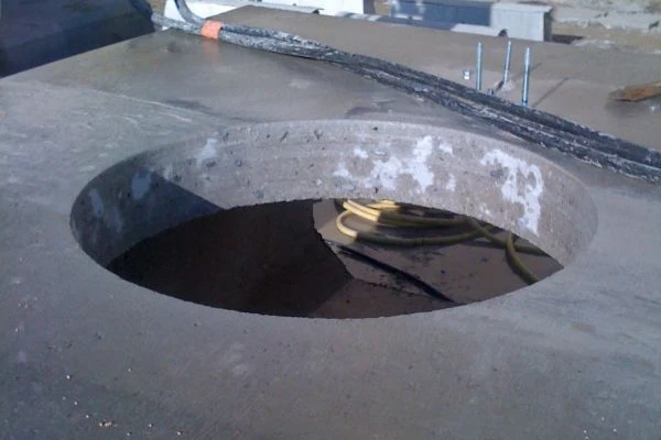 Carottage d'une dalle pour installer une cave enterrée